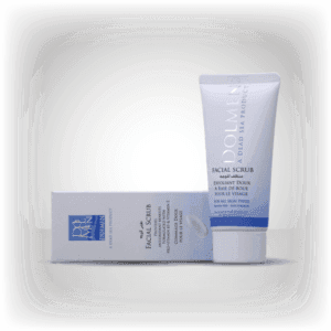 Tube of Dolmen facial scrub standing next to its white and blue packaging on a white surface.