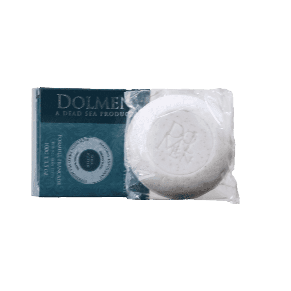 Dolmen Dead Sea product box with a round, white soap wrapped in plastic packaging.